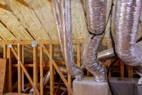 Insulated residential HVAC ductwork installed across an attic in Contra Costa County